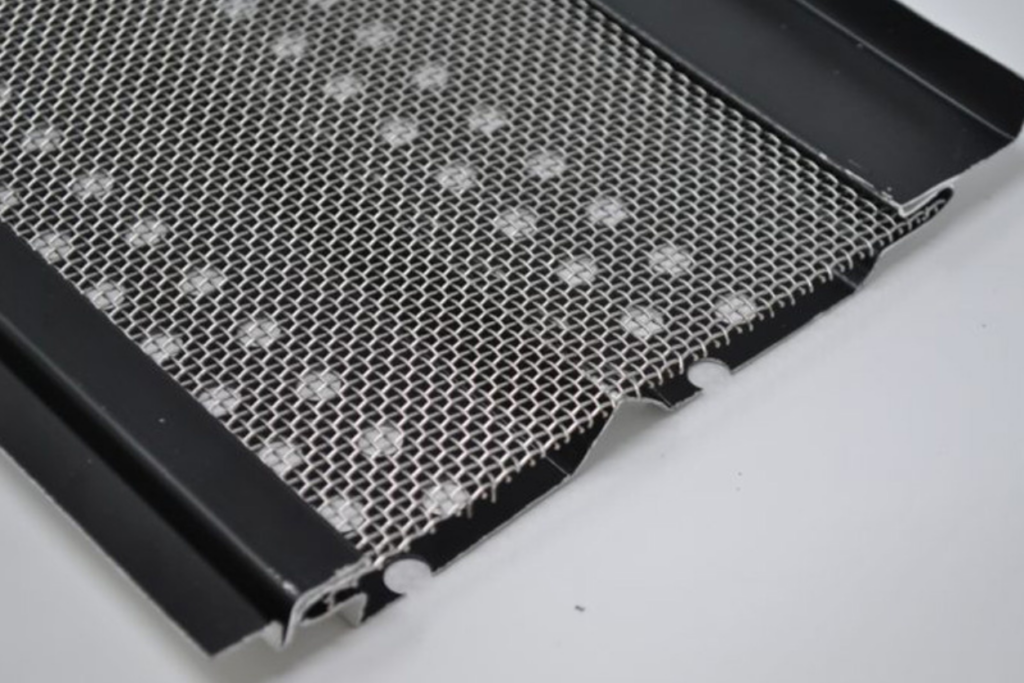 One Gutter Guard showing the stainless steel mesh insert providing the best gutter protection for people wondering "are gutter guards worth it?