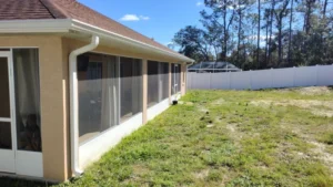 A home in Florida with gutters installed after they called Rain Storm Solutions to learn how to install gutters.