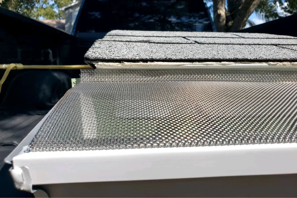 Installing gutter guards on a home in Florida.