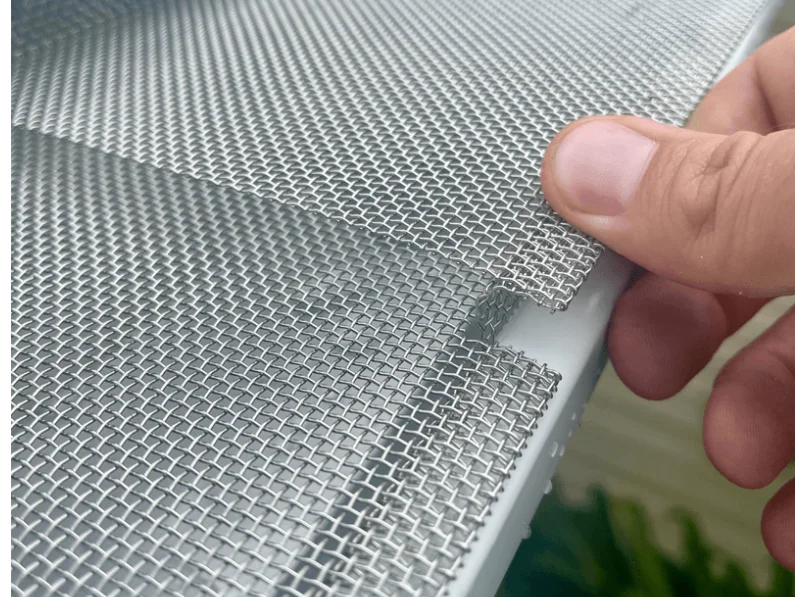 Professional installing Gutter Guards